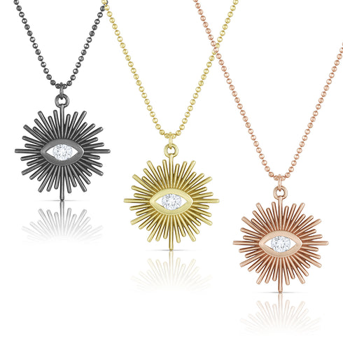 our related sunburst diamond-kissed pendant necklaces,<br>in your choice of white or black diamond <span class='visuallyhidden'>Call or text 323-404-2959 if you need shopping assistance.</span>